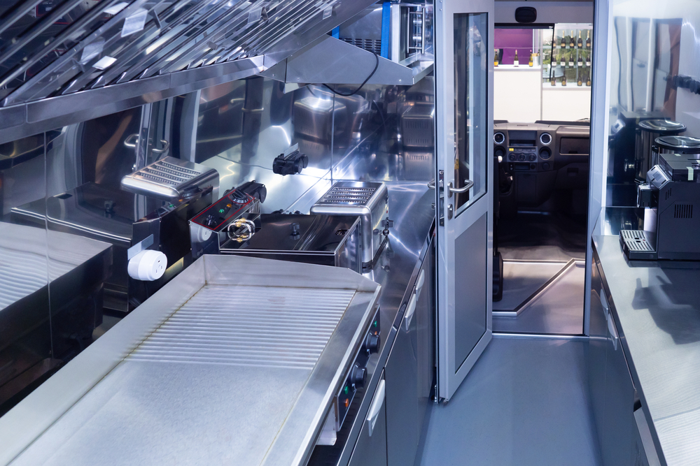 Mobile restaurant. Cafe on wheels. Kitchen in the van. Mobile cafe. The machine is equipped with kitchen equipment. Cooking in a special van.